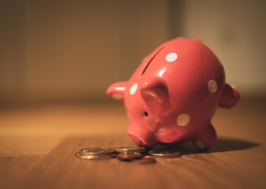 Piggy bank savings with coins